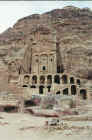 The burial tombs of the royals with carved facades in the sandstone cliffs 