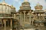 These are not tombs, nor do they contain ashes; instead these are memorials built by the two succeeding generations of a maharana. 
